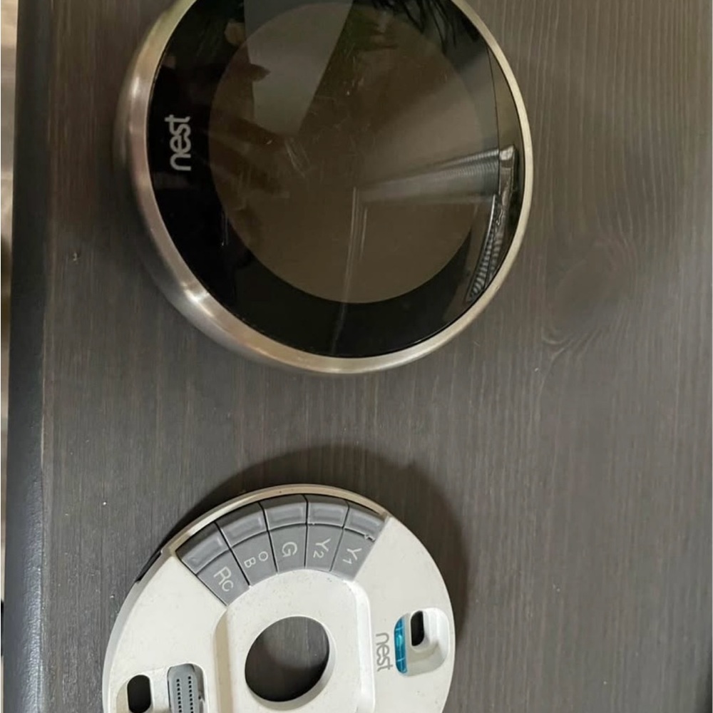 Smart Thermostat with Black and Silver Design